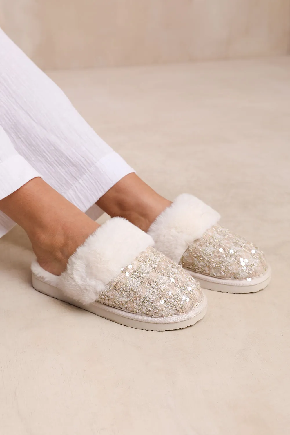 COZY SLIP ON SEQUIN SLIPPERS WITH FUR TRIM IN BEIGE